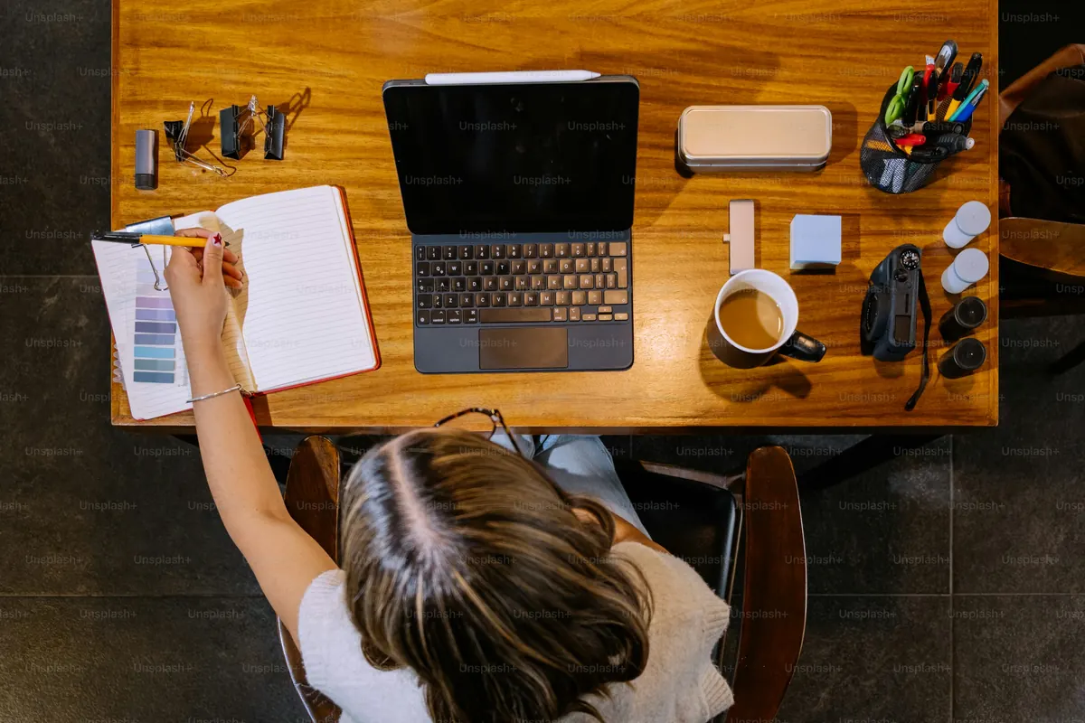 Remote business workspace with laptop and documents